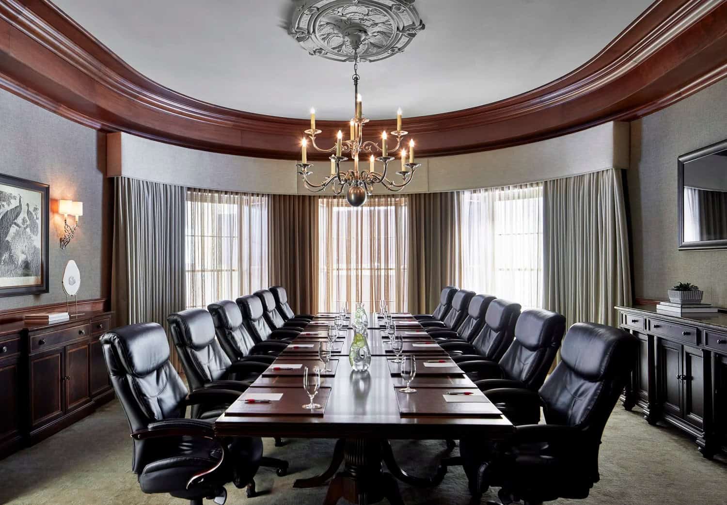 Elegant conference room at Lancaster County Convention Center with large table and chandelier.