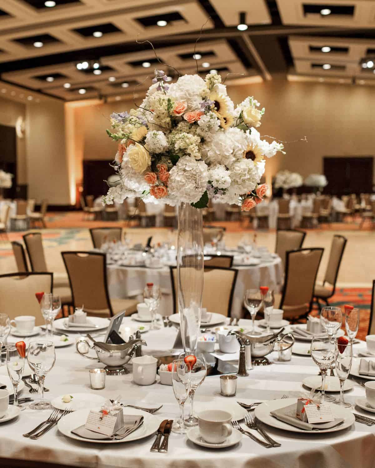 Elegant event setup at Lancaster County Convention Center with floral centerpiece.
